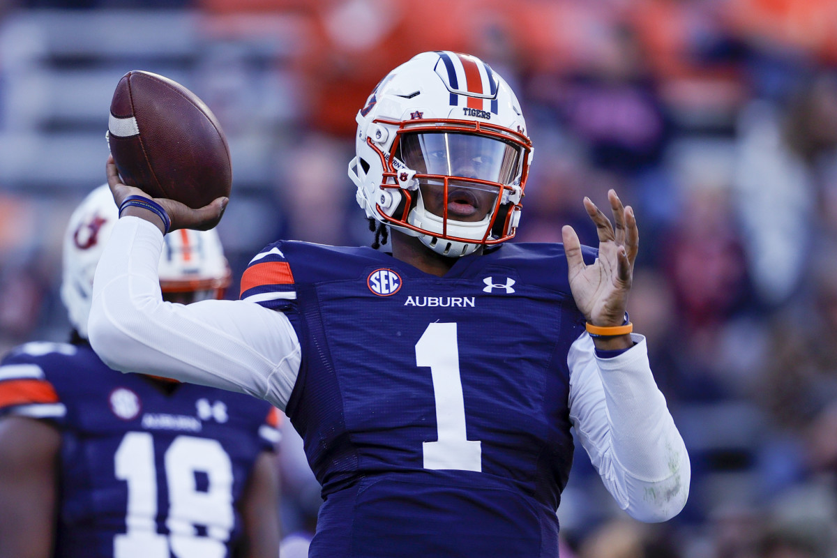 Auburn quarterback TJ Finley (1) warms up before the start of an NCAA college football game against Alabama Saturday, Nov. 27, 2021, in Auburn, Ala. (AP Photo/Butch Dill)